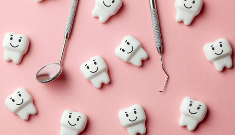 smiling teeth on pink backdrop